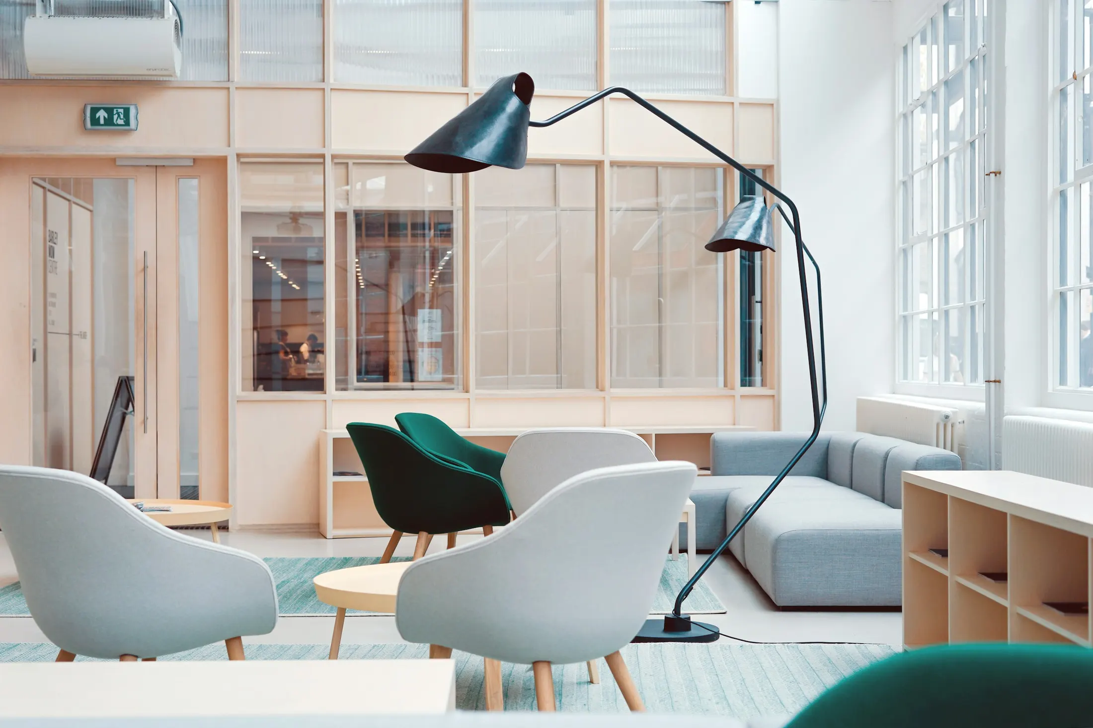 Modern commercial office workspace with desks and furniture